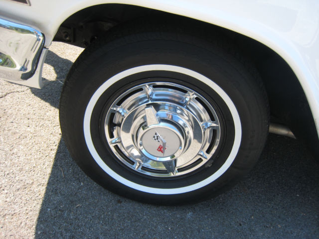 White 1960 Chevrolet Impala Hardtop with red interior