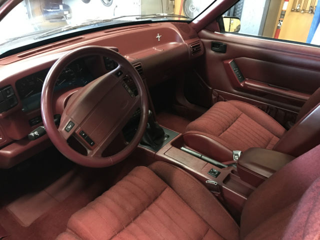 Black 1993 Ford Mustang Hatchback with Red interior
