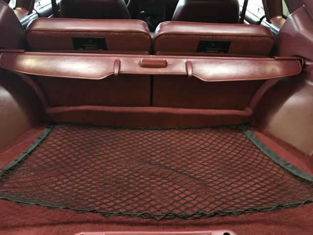 Black 1993 Ford Mustang Hatchback with Red interior