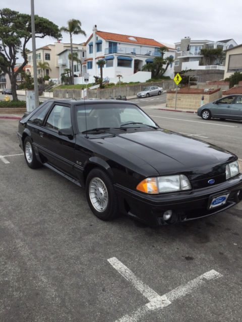 Black 1989 Ford Mustang with Tan interior