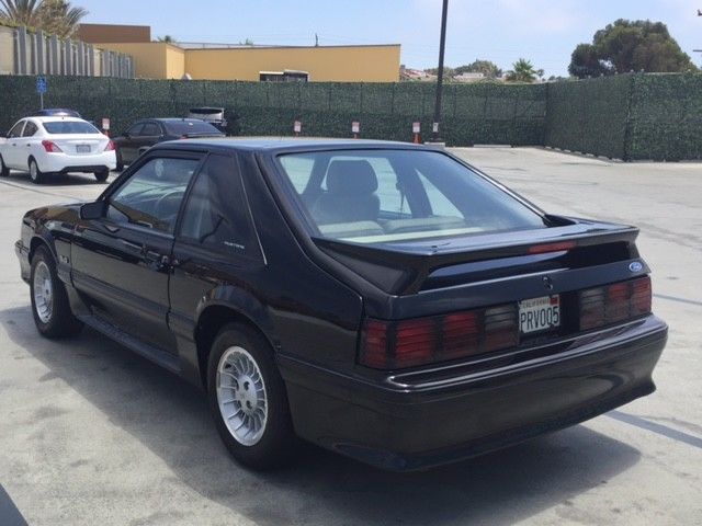 Black 1989 Ford Mustang with Tan interior