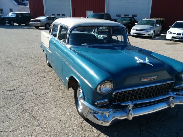 Blue and creme 1955 Chevrolet Bel Air/150/210 Sedan with blue interior