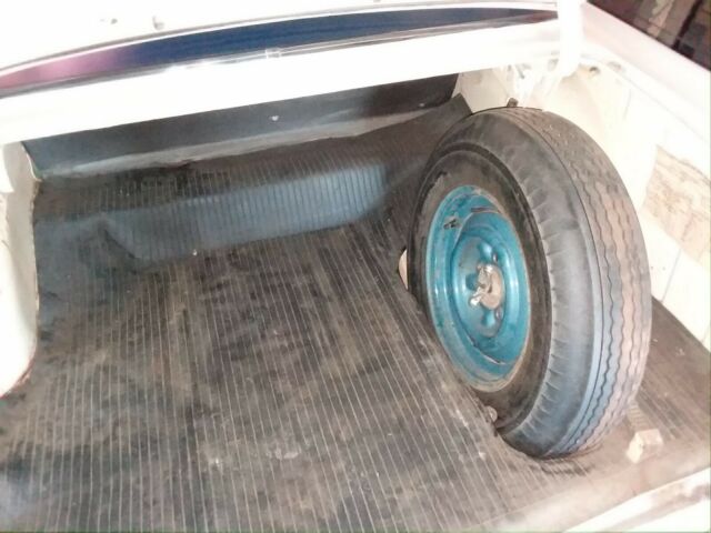 Blue and creme 1955 Chevrolet Bel Air/150/210 Sedan with blue interior