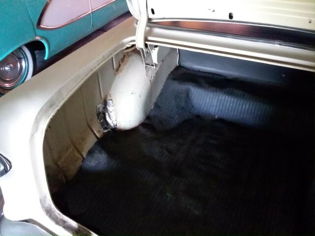 Blue and creme 1955 Chevrolet Bel Air/150/210 Sedan with blue interior