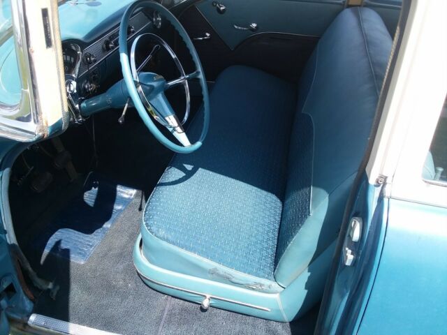 Blue and creme 1955 Chevrolet Bel Air/150/210 Sedan with blue interior