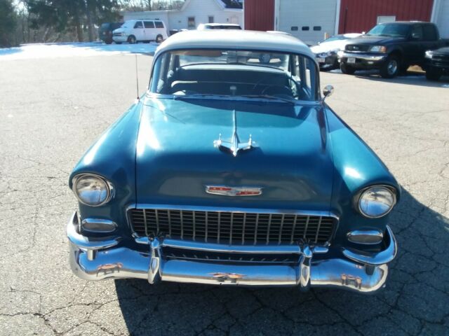 Blue and creme 1955 Chevrolet Bel Air/150/210 Sedan with blue interior