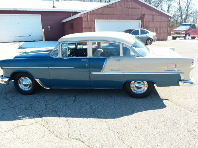 Blue and creme 1955 Chevrolet Bel Air/150/210 Sedan with blue interior