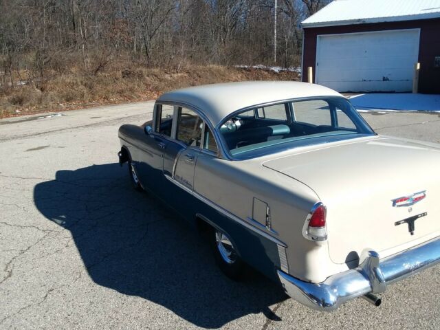Blue and creme 1955 Chevrolet Bel Air/150/210 Sedan with blue interior