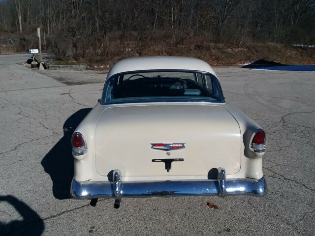 Blue and creme 1955 Chevrolet Bel Air/150/210 Sedan with blue interior
