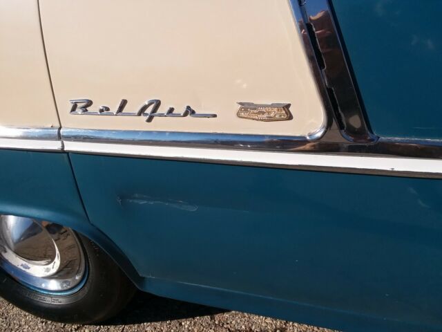 Blue and creme 1955 Chevrolet Bel Air/150/210 Sedan with blue interior