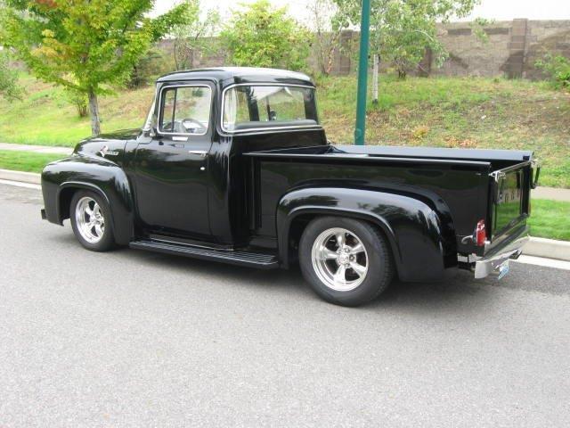 black 1956 Ford F-100 with grey interior