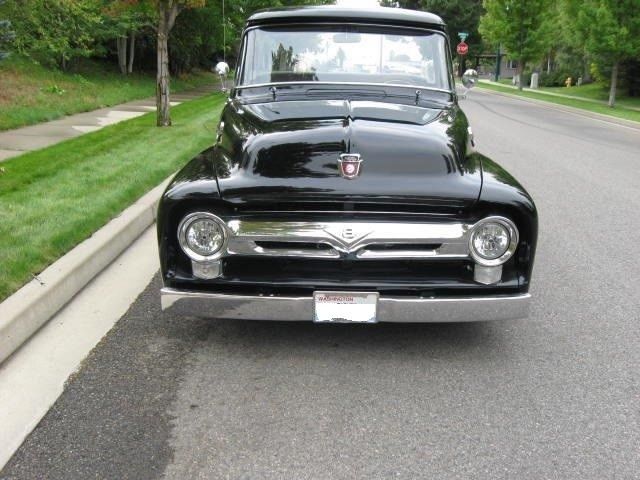 black 1956 Ford F-100 with grey interior