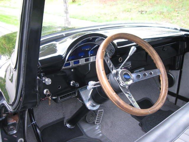 black 1956 Ford F-100 with grey interior