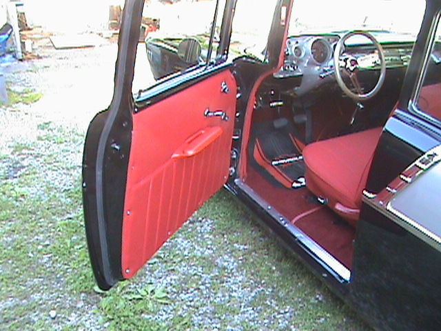Black and Grey 1957 Chevrolet Bel Air/150/210 2 door post with Red interior