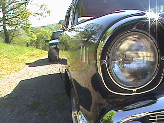 Black and Grey 1957 Chevrolet Bel Air/150/210 2 door post with Red interior