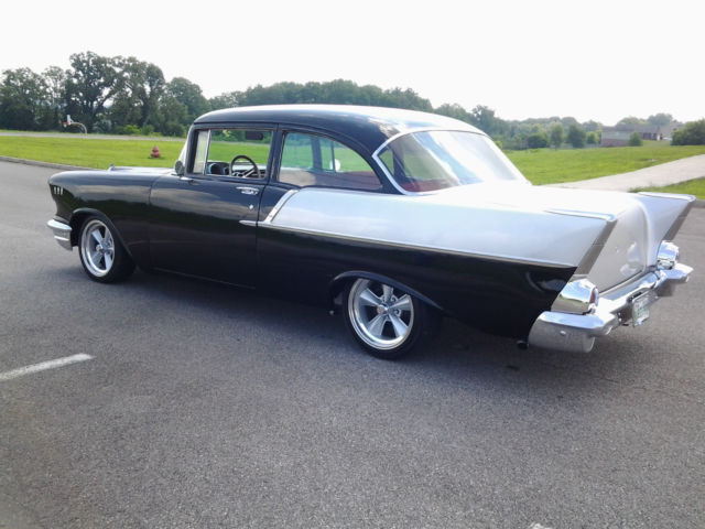 Black and Grey 1957 Chevrolet Bel Air/150/210 2 door post with Red interior