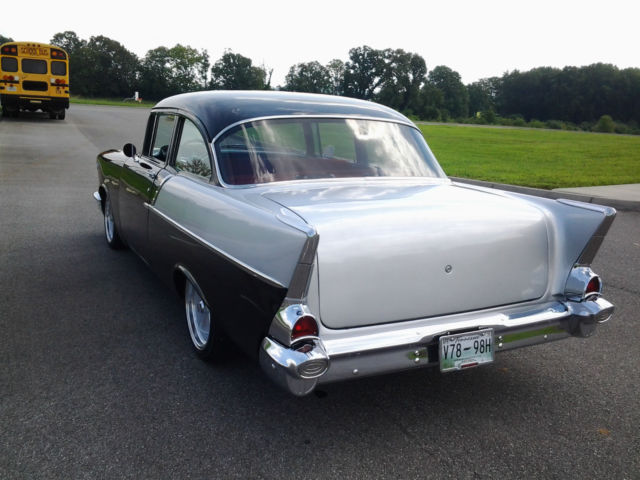 Black and Grey 1957 Chevrolet Bel Air/150/210 2 door post with Red interior