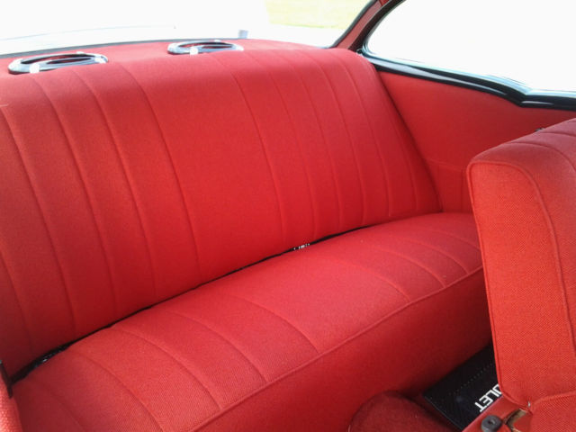 Black and Grey 1957 Chevrolet Bel Air/150/210 2 door post with Red interior