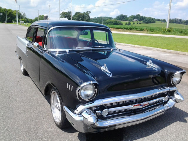 Black and Grey 1957 Chevrolet Bel Air/150/210 2 door post with Red interior