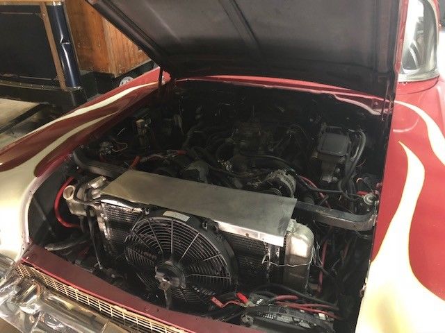 Red 1957 Chevrolet Bel Air/150/210 Convertible with Black / White interior