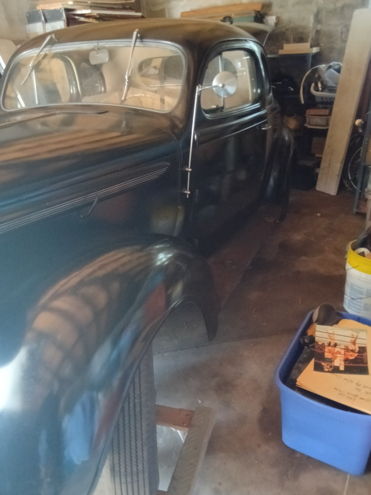 Black 1938 Plymouth 100 Coupe with Tan interior