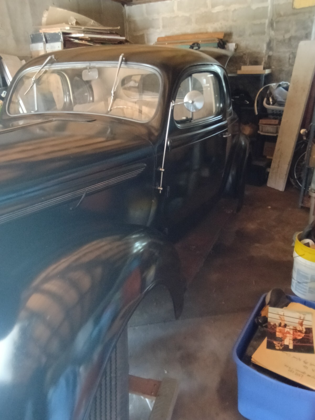 Black 1938 Plymouth 100 Coupe with Tan interior