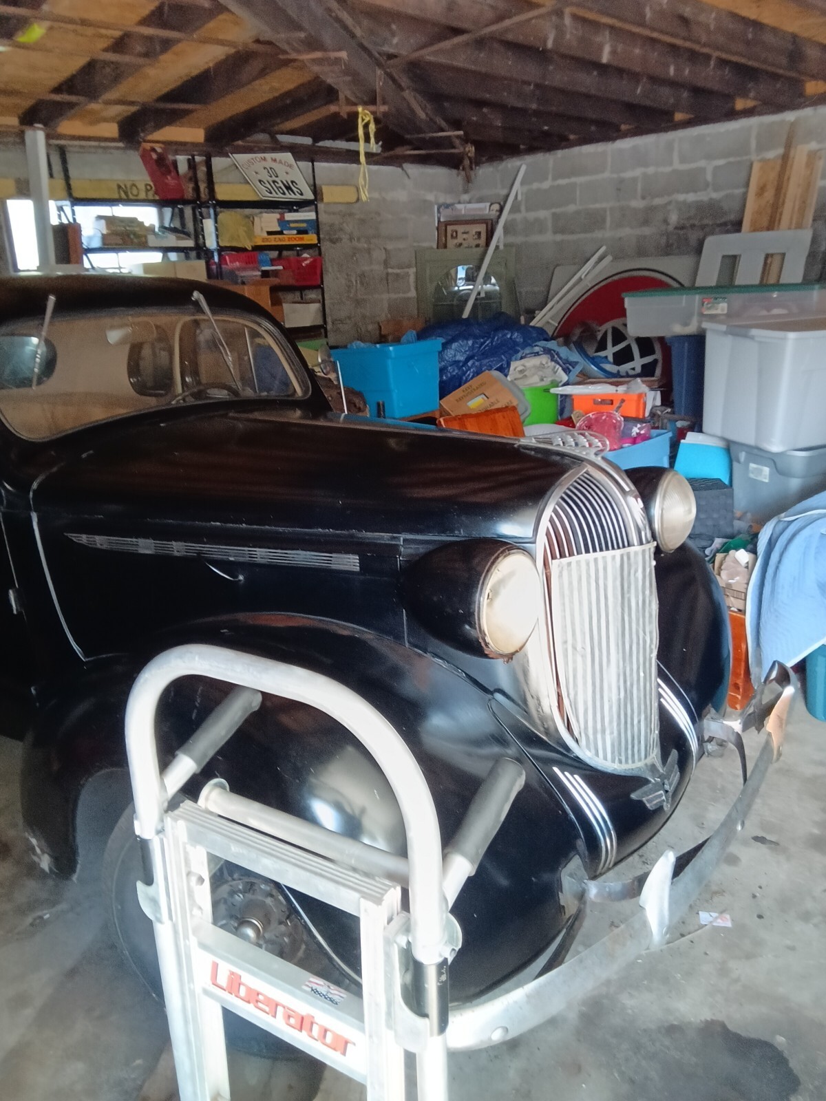 Black 1938 Plymouth 100 Coupe with Tan interior