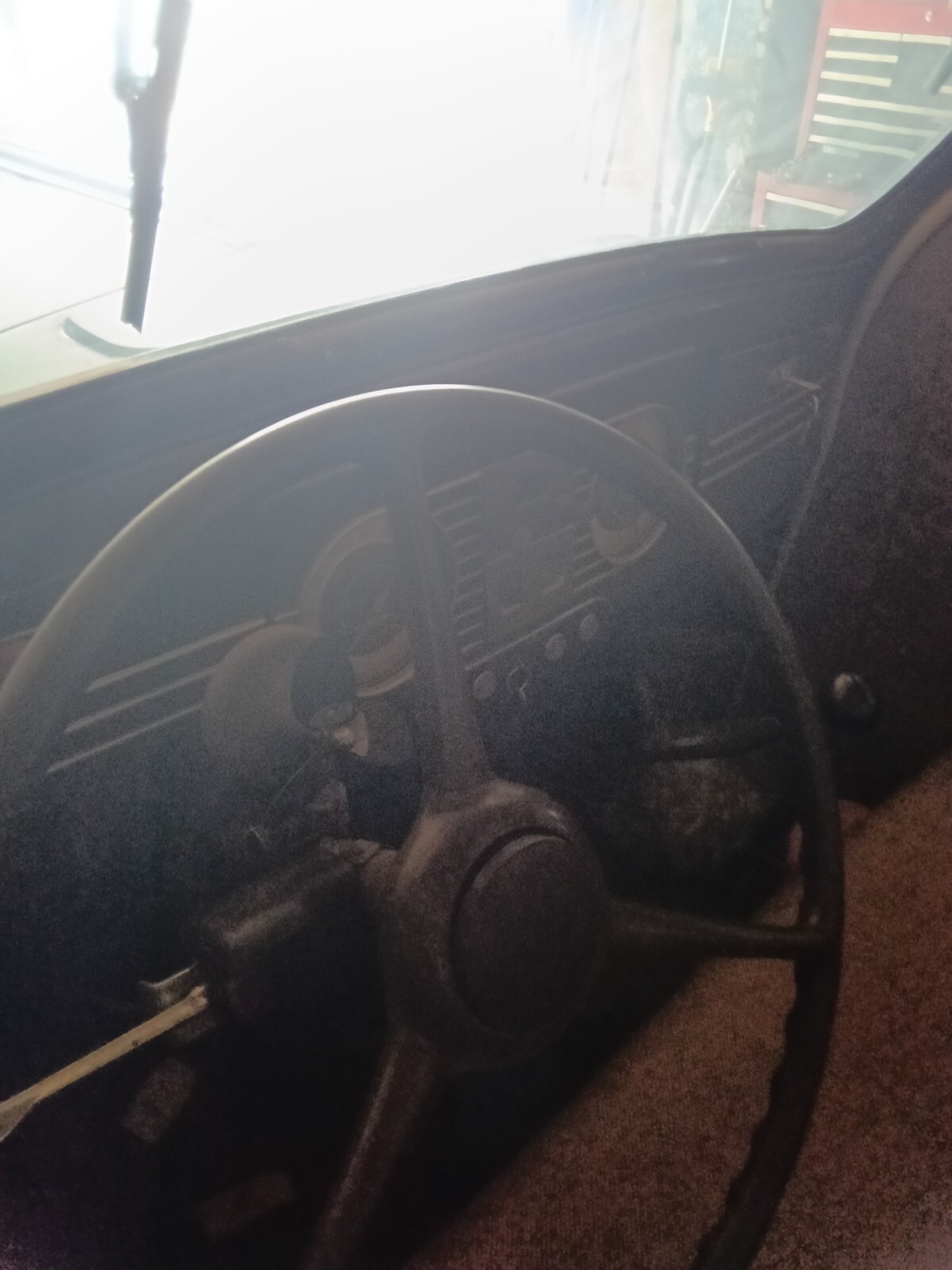 Black 1938 Plymouth 100 Coupe with Tan interior