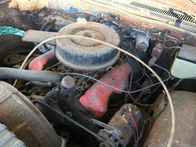 Black 1961 Chevrolet Impala 2 door with Red interior