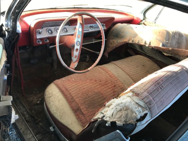 Black 1961 Chevrolet Impala 2 door with Red interior
