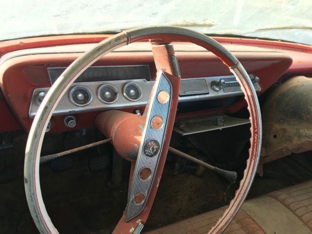 Black 1961 Chevrolet Impala 2 door with Red interior