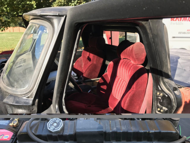 Black 1964 Chevrolet C-10 pickup with Burgundy interior