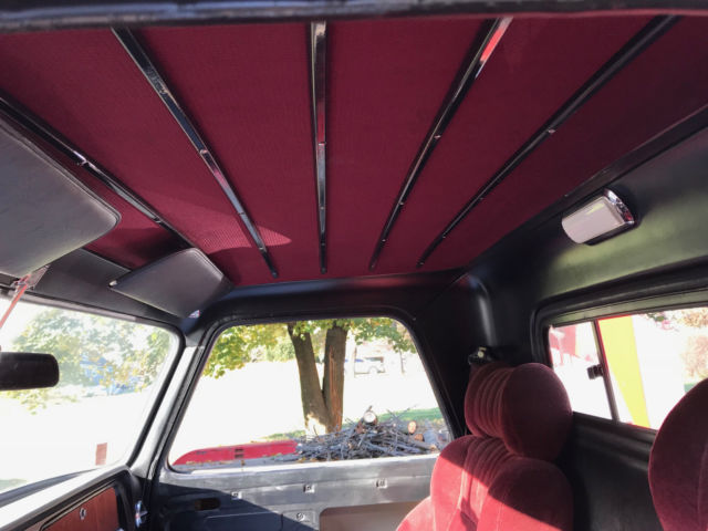 Black 1964 Chevrolet C-10 pickup with Burgundy interior