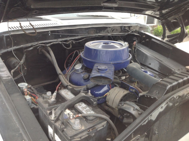 Teal 1973 Ford F-250 Cab & Chassis with White interior