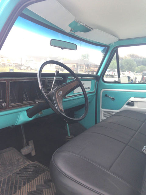 Teal 1973 Ford F-250 Cab & Chassis with White interior