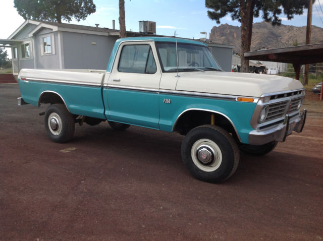 Teal 1973 Ford F-250 Cab & Chassis with White interior