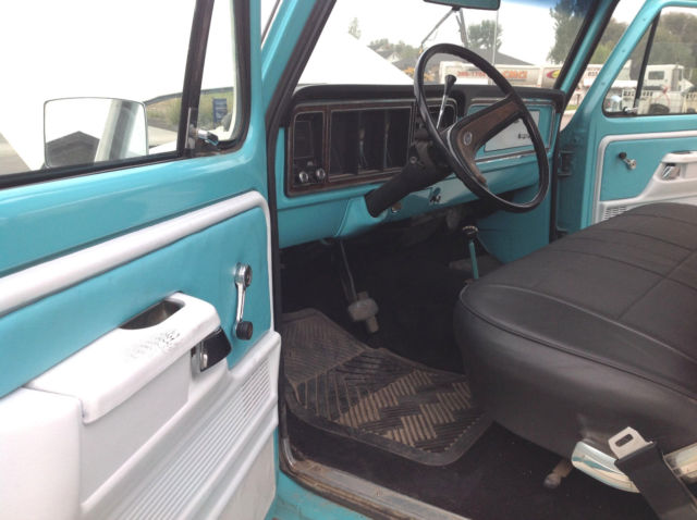 Teal 1973 Ford F-250 Cab & Chassis with White interior