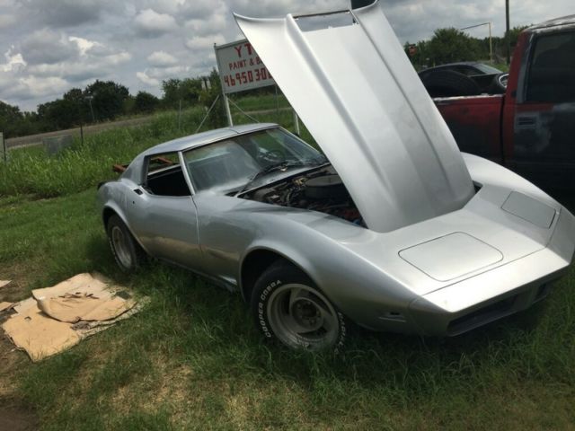Silver 1974 Chevrolet Corvette Coupe with Red interior