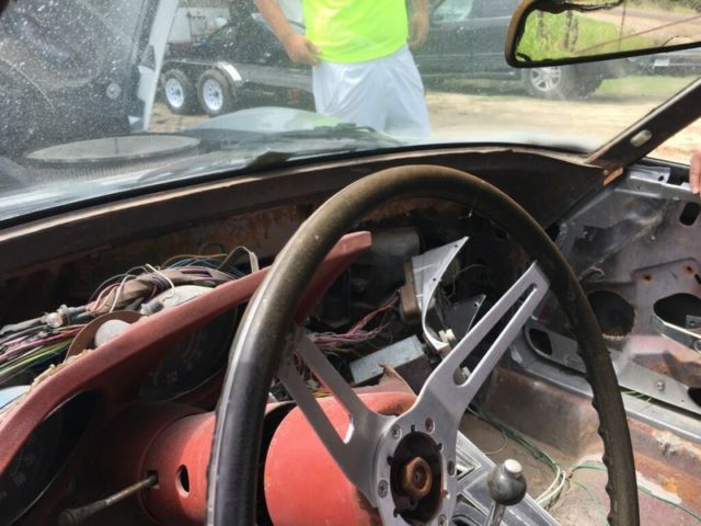 Silver 1974 Chevrolet Corvette Coupe with Red interior