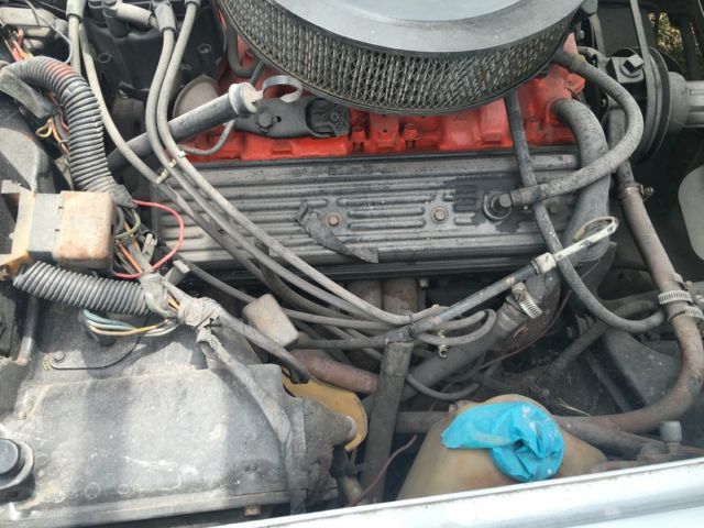 Silver 1974 Chevrolet Corvette Coupe with Red interior