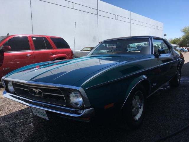 Green 1972 Ford Mustang Coupe with Tan interior