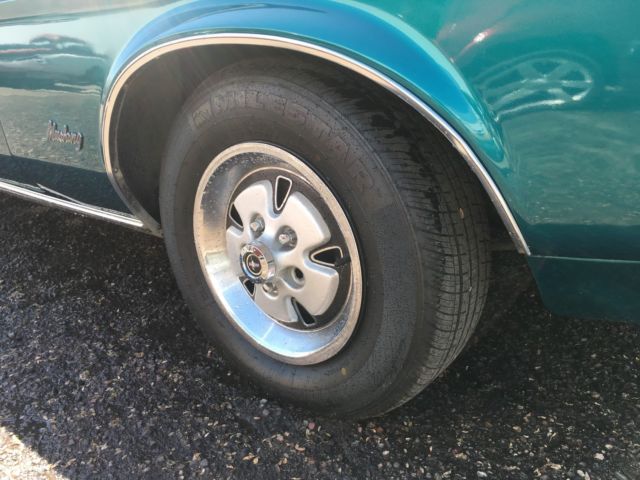 Green 1972 Ford Mustang Coupe with Tan interior