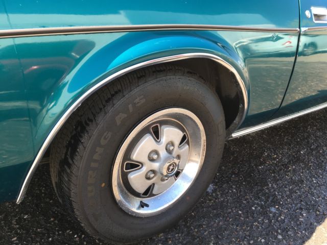 Green 1972 Ford Mustang Coupe with Tan interior