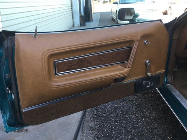 Green 1972 Ford Mustang Coupe with Tan interior