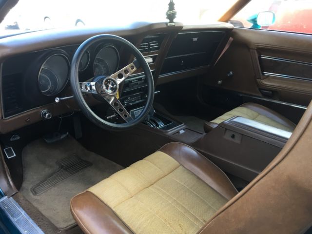 Green 1972 Ford Mustang Coupe with Tan interior