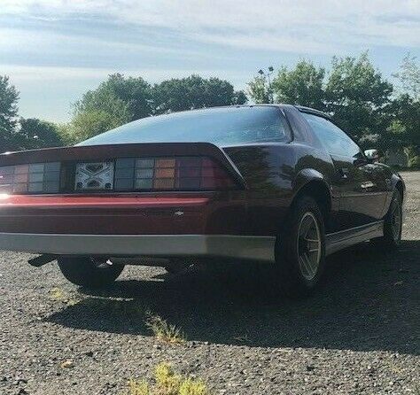 Burgundy 1987 Chevrolet Camaro Hatchback with Red interior