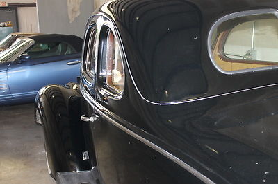 Black 1938 Ford 85 Coupe Coupe with Brown interior