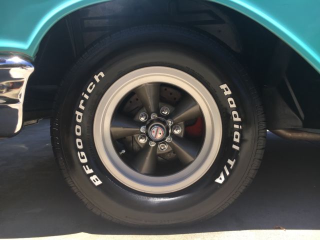 turquoise and India Ivory 1957 Chevrolet Bel Air/150/210 sedan with turquoise interior