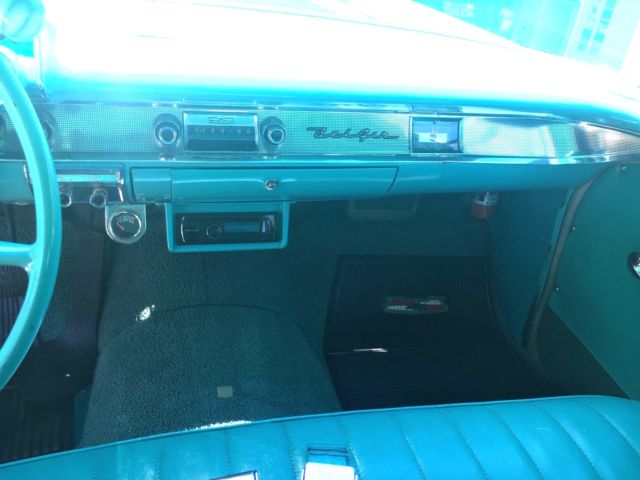 turquoise and India Ivory 1957 Chevrolet Bel Air/150/210 sedan with turquoise interior