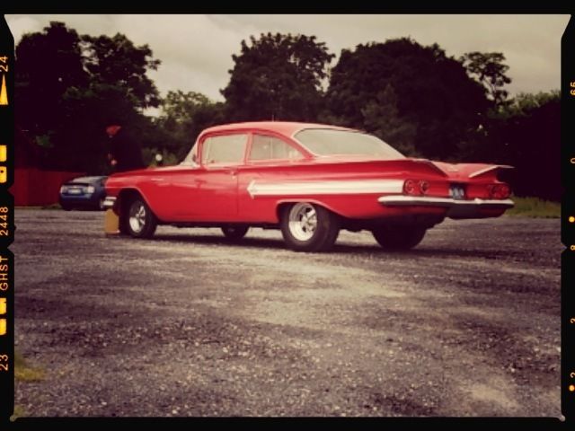 Red 1960 Chevrolet Bel Air/150/210 2 Door Post with Red/White interior